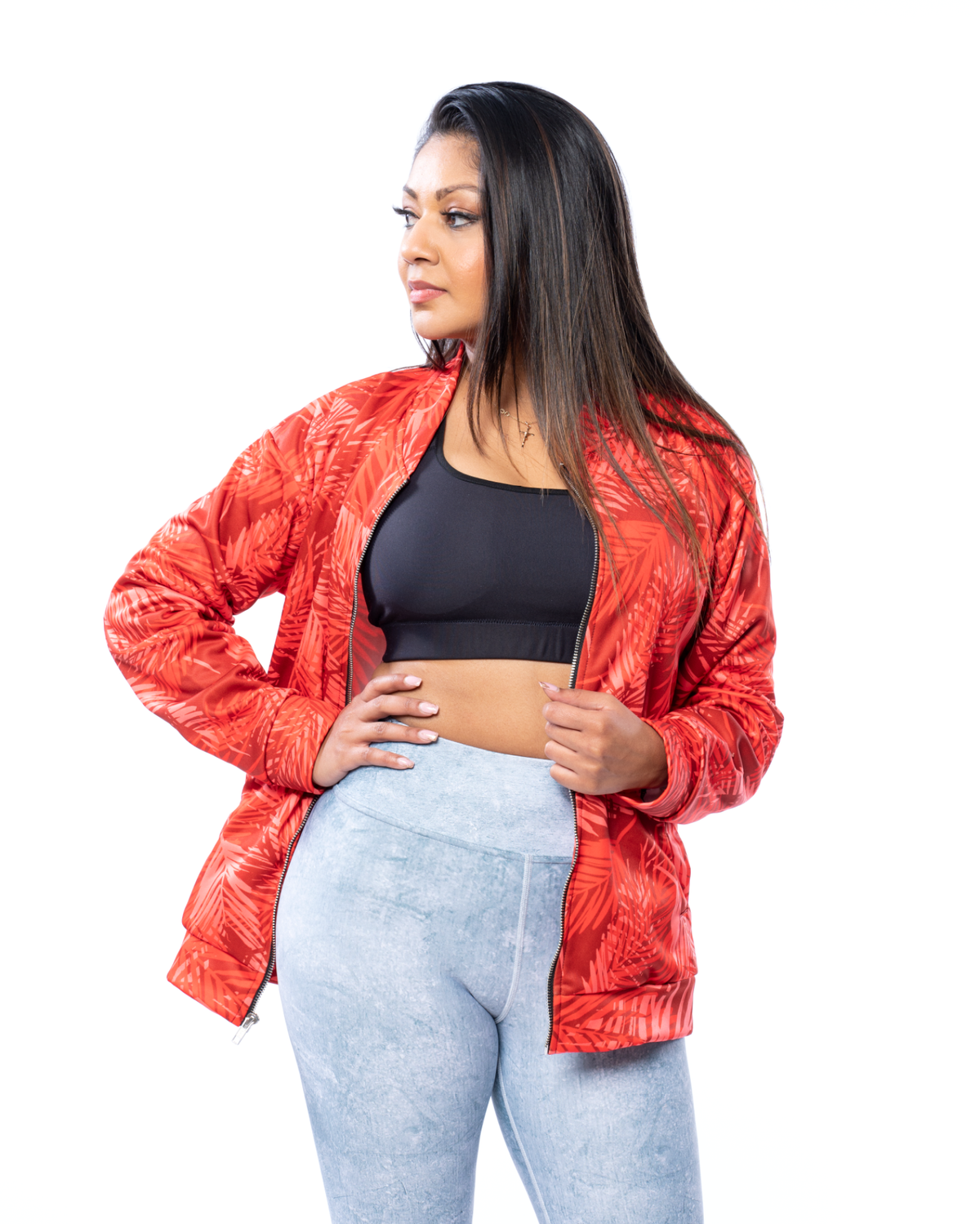 red bomber jacket black crop top and high waisted grey leggings concrete pattern